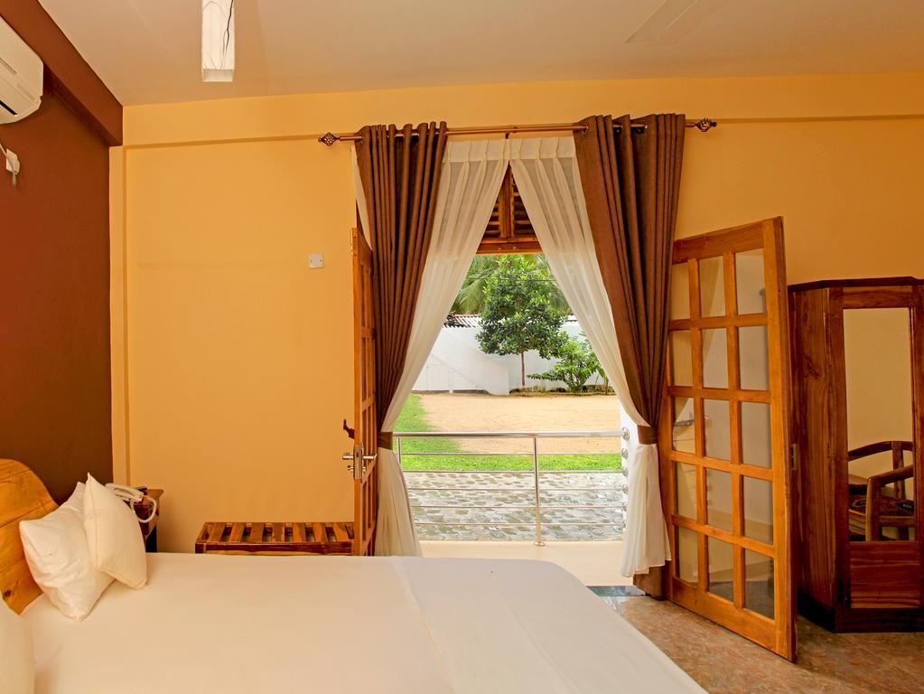 Bluewater Beach Resort Тринкомали Номер фото
